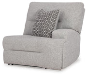 Ashley Furniture Acklen Place sectional sofa viewed from an angle, showcasing plush cushions and modern design.