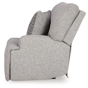 Ashley Furniture Acklen Place sectional with beige upholstery, showing a side view of the comfortable, modern sofa.