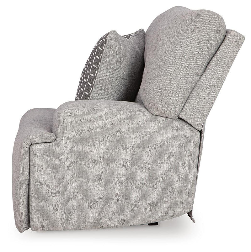Ashley Furniture Acklen Place sectional with beige upholstery, showing a side view of the comfortable, modern sofa.