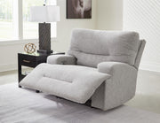 Open Ashley Furniture Acklen Place oversized power recliner showing plush upholstery and reclining mechanism in a living room setting.