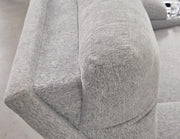 Ashley Furniture Acklen Place oversized power recliner with plush upholstery and adjustable headrest, shown in a cozy living room setting.