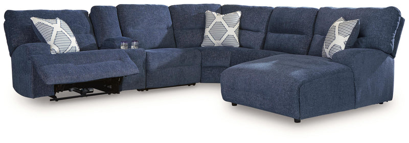 Ashley Furniture Acklen Place power reclining sectional with chaise, featuring plush cushions and a modern design.