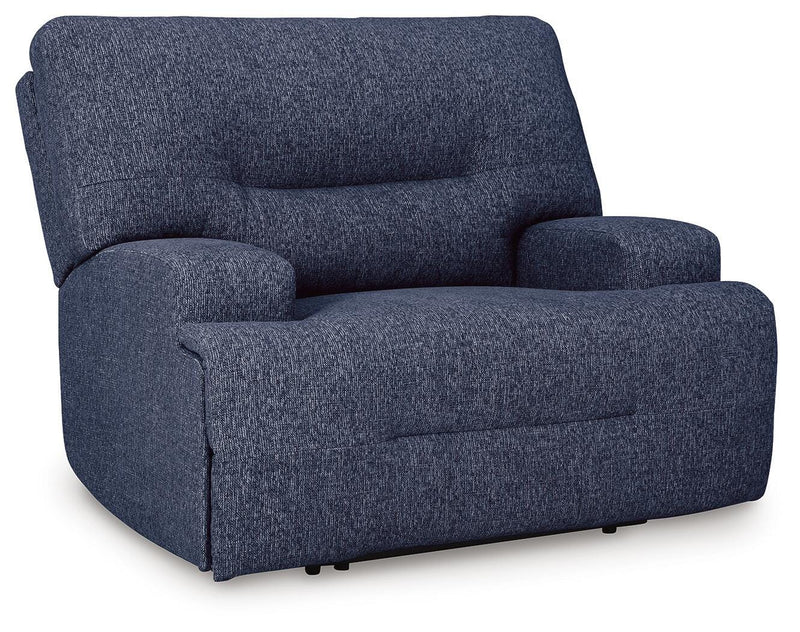 Ashley Furniture Acklen Place oversized power recliner in dark upholstery, shown from an angled closed position.