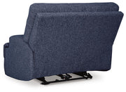 Ashley Furniture Acklen Place oversized power recliner with plush upholstery and back support, shown from the rear view.