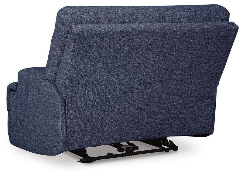 Ashley Furniture Acklen Place oversized power recliner with plush upholstery and back support, shown from the rear view.