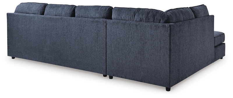 Ashley Furniture Albar Place sectional sofa with plush cushions and modern design, shown from the back view.