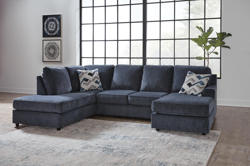 Ashley Furniture Albar Place Sectional in neutral fabric with plush cushions and wide armrests, perfect for modern living rooms.