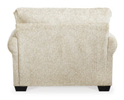 Ashley Furniture Monaghan oversized chair with plush fabric and wide armrests, shown from the back.