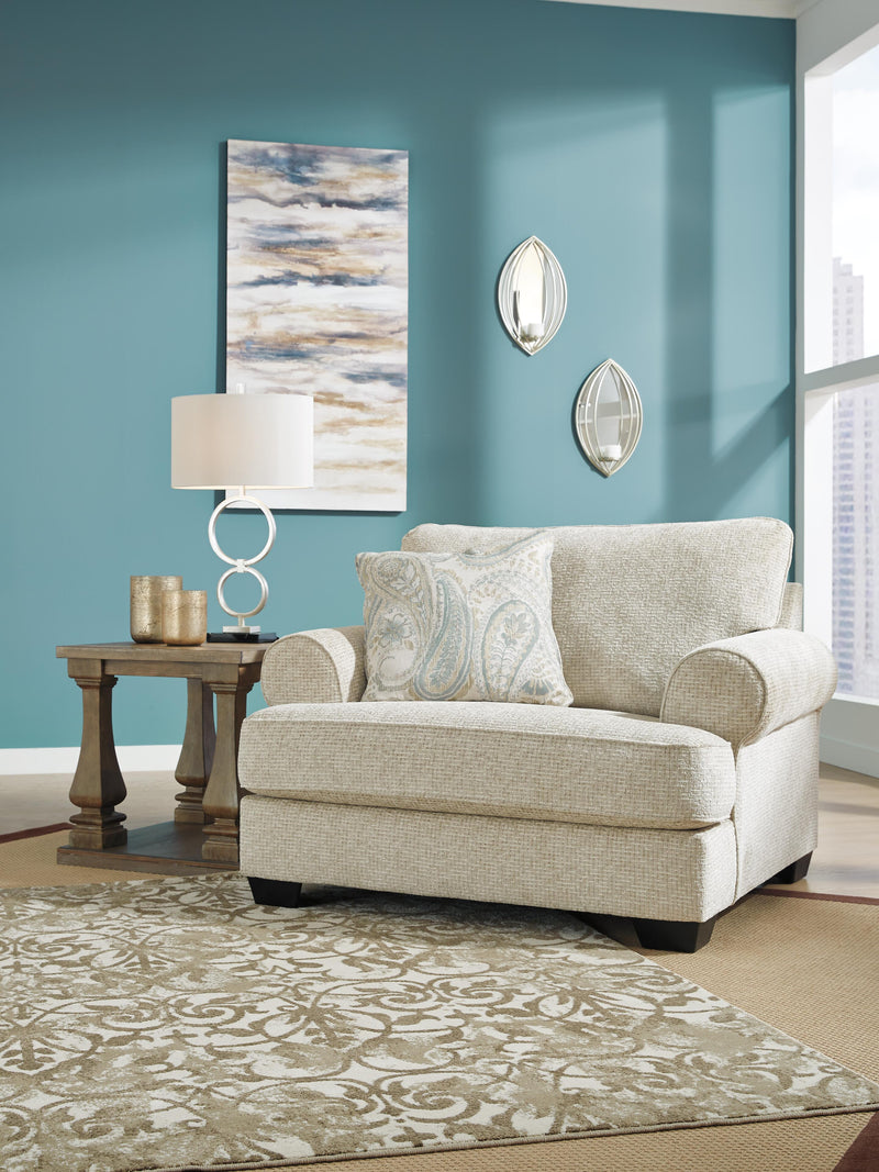 Ashley Furniture Monaghan oversized chair with plush upholstery and wide armrests, perfect for a cozy living room setting.