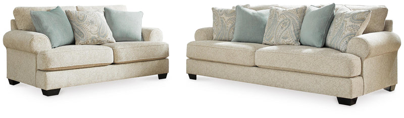 Ashley Furniture Monaghan living room set with sofa and armchair in a cozy, modern living room setting.