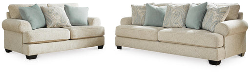 Ashley Furniture Monaghan living room set with sofa and armchair in a cozy, modern living room setting.