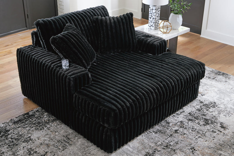 Ashley Furniture Midnight-Madness oversized chaise chair with plush upholstery and contemporary design, ideal for modern living rooms.