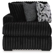 Ashley Furniture Midnight-Madness sectional with chaise, showing plush fabric and modern design from a head-on view.