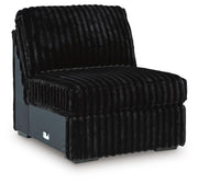 Ashley Furniture Midnight-Madness sectional sofa seen from an angle, showcasing its modern design and plush upholstery.