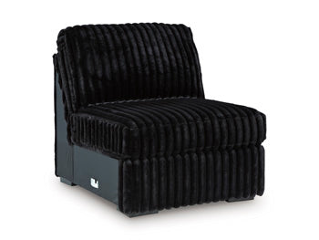 Ashley Furniture Midnight-Madness sectional sofa with plush cushions and modern design, shown from an angled perspective.