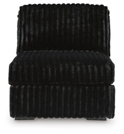 Ashley Furniture Midnight-Madness sectional sofa with plush fabric and modern design, shown from a head-on view.