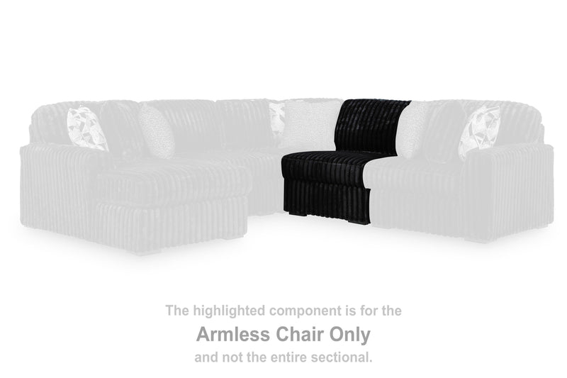 Ashley Furniture Midnight-Madness sectional sofa in dark upholstery, showing plush cushions and modern design.
