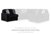 Ashley Furniture Midnight-Madness sectional sofa with plush cushions and dark fabric, shown in a modern living room setting.