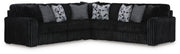 Ashley Furniture Midnight-Madness sectional with plush fabric, featuring a modern L-shaped sofa with multiple cushions and sleek design.