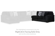 Ashley Furniture Midnight-Madness sectional sofa with plush cushions and dark fabric, shown in a modern living room setting.