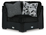 Ashley Furniture Midnight-Madness Sectional sofa with plush cushions and dark fabric, viewed from the head-on angle.