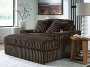 Ashley Furniture Midnight-Madness oversized chaise lounge chair with plush dark upholstery and wide, comfortable seating.