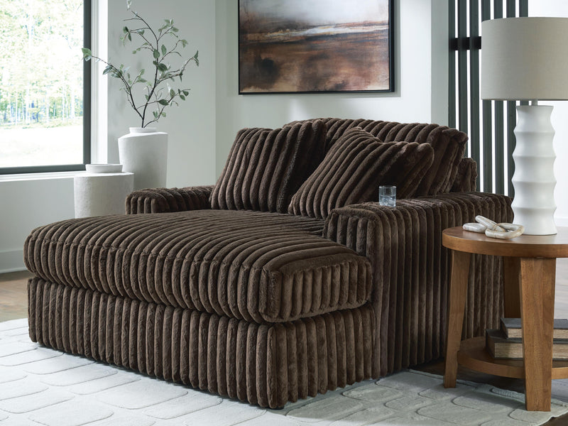 Ashley Furniture Midnight-Madness oversized chaise lounge chair with plush dark upholstery and wide, comfortable seating.