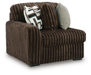 Ashley Furniture Midnight-Madness sectional sofa shown from an angled view with plush cushions and modern design.