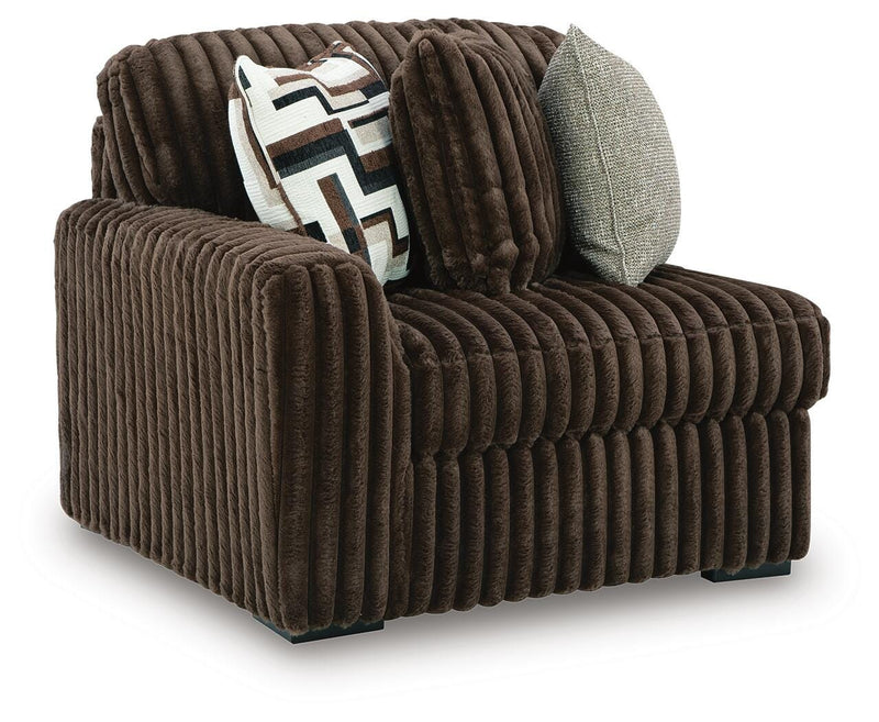 Ashley Furniture Midnight-Madness sectional sofa shown from an angled view with plush cushions and modern design.
