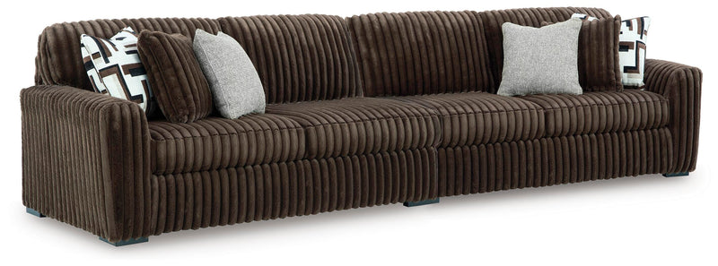 Ashley Furniture Midnight-Madness Sectional with dark upholstery and modern design, shown from an angled view.