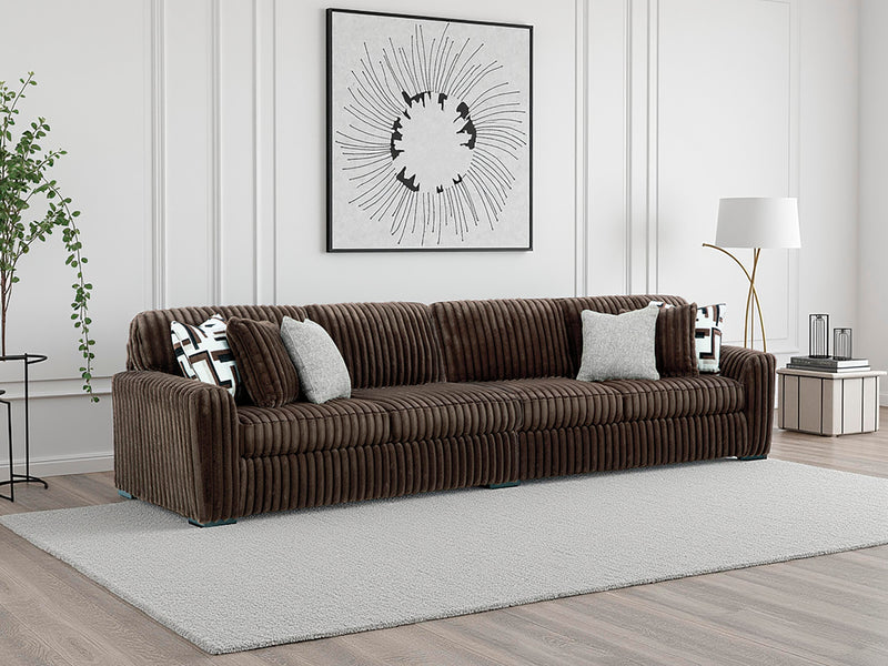 Ashley Furniture Midnight-Madness Sectional sofa with plush cushions and modern design in a stylish living room setting.