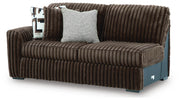 Ashley Furniture Midnight-Madness sectional sofa shown from an angled view with plush cushions and modern design.