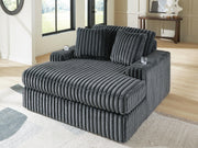 Ashley Furniture Midnight-Madness Oversized Chaise chair with plush gray upholstery and wide, comfortable seating.