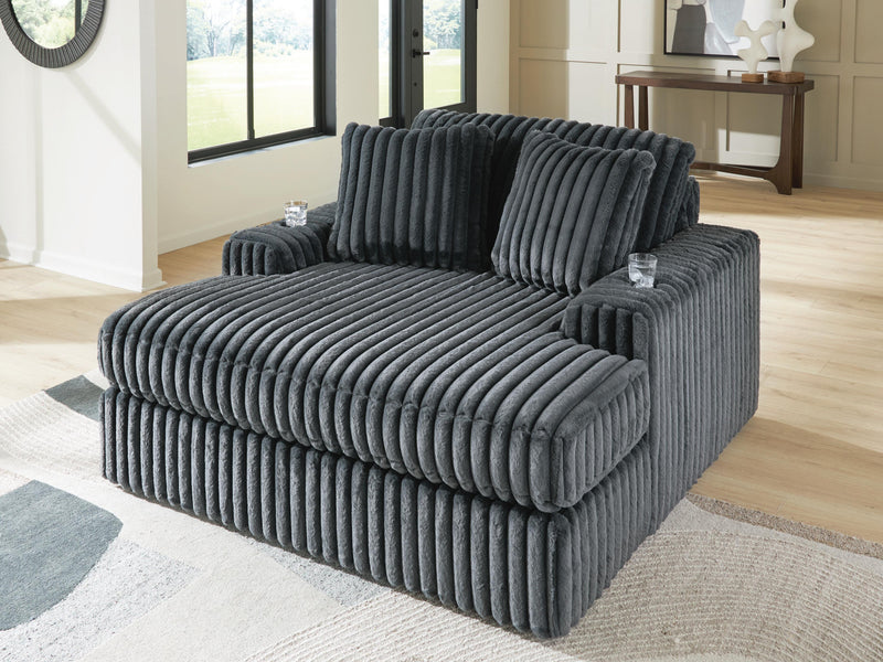 Ashley Furniture Midnight-Madness Oversized Chaise chair with plush gray upholstery and wide, comfortable seating.