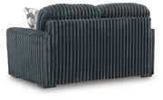 Ashley Furniture Midnight-Madness Loveseat with plush fabric and modern design, shown from the back view.