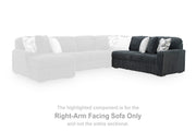 Ashley Furniture Midnight-Madness sectional sofa with dark upholstery, featuring plush cushions and modern design.