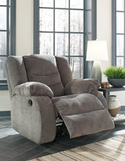 Open Ashley Furniture Tulen recliner showing plush upholstery and ergonomic design in a living room setting.