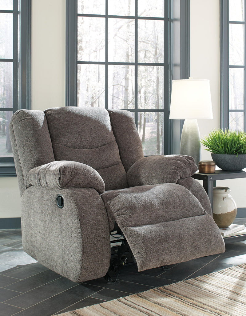 Open Ashley Furniture Tulen recliner showing plush upholstery and ergonomic design in a living room setting.
