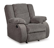 Ashley Furniture Tulen Recliner in soft fabric, showing plush cushioning and armrests, ideal for comfortable relaxation.