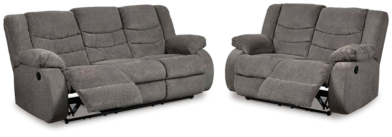 Ashley Furniture Tulen living room set featuring a sofa and armchair with neutral fabric upholstery and modern design.