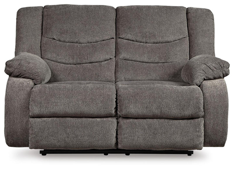 Ashley Furniture Tulen living room set with sofa and armchair in a modern design, shown in a cozy living space.