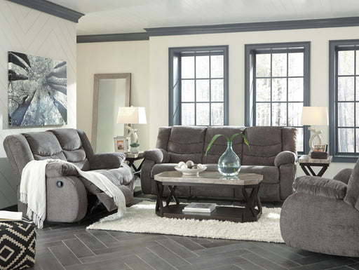 Ashley Furniture Tulen Living Room Set featuring a sofa and loveseat with neutral upholstery and contemporary design.