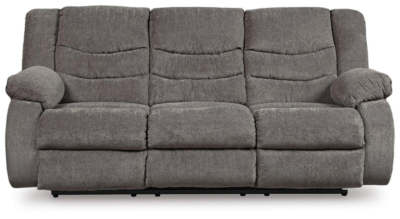 Ashley Furniture Tulen Reclining Sofa in dark brown fabric, showing plush cushions and reclining feature.