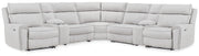 Ashley Furniture Social Pointe reclining sectional with storage consoles, featuring plush cushions and modern design.