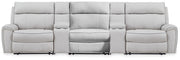 Ashley Furniture Social Pointe reclining sectional with storage consoles, featuring plush cushions and modern design.