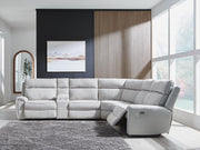 Ashley Furniture Social Pointe reclining sectional with storage console, showing plush fabric, reclining seats, and built-in storage.