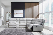 Ashley Furniture Social Pointe reclining sectional with built-in storage consoles, featuring plush cushions and modern design.