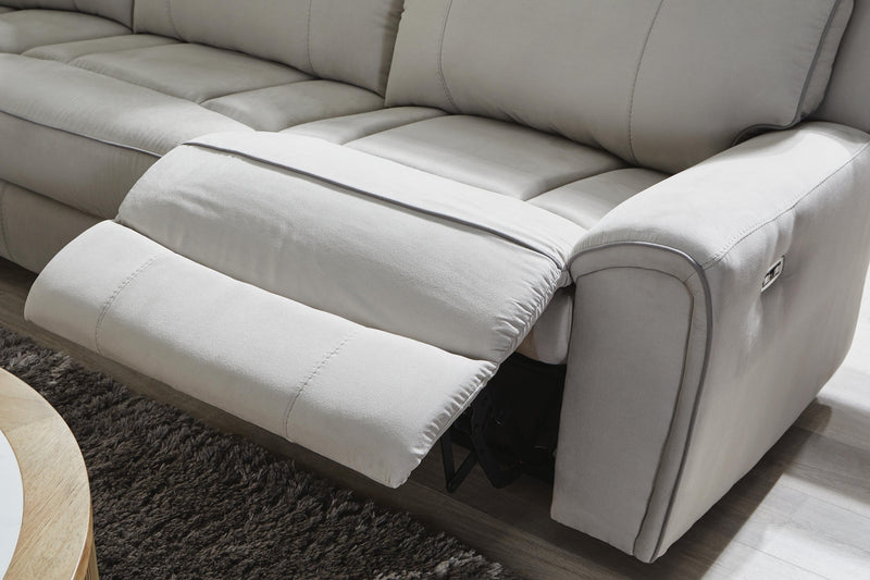 Ashley Furniture Social Pointe reclining sectional with storage console, featuring plush cushions and modern design.