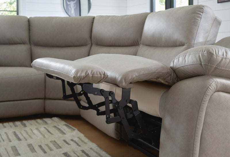 Ashley Furniture Narwhal Place reclining sectional sofa with storage console, featuring plush cushions and modern design.