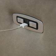 Ashley Furniture Narwhal Place reclining sectional with storage console, showcasing plush fabric, reclining seats, and built-in USB ports.